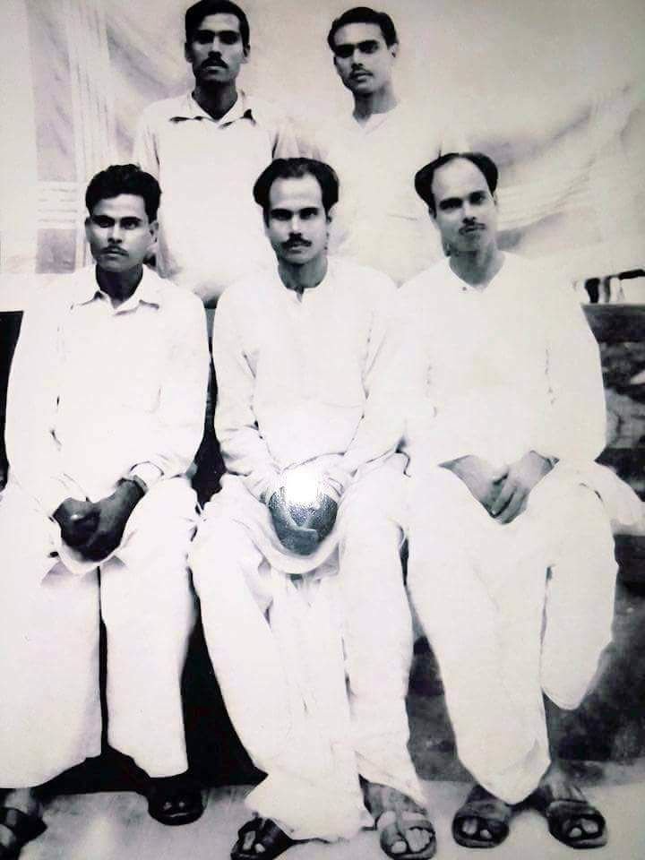 Amiyabhushan with his brothers (Seating: Centre)